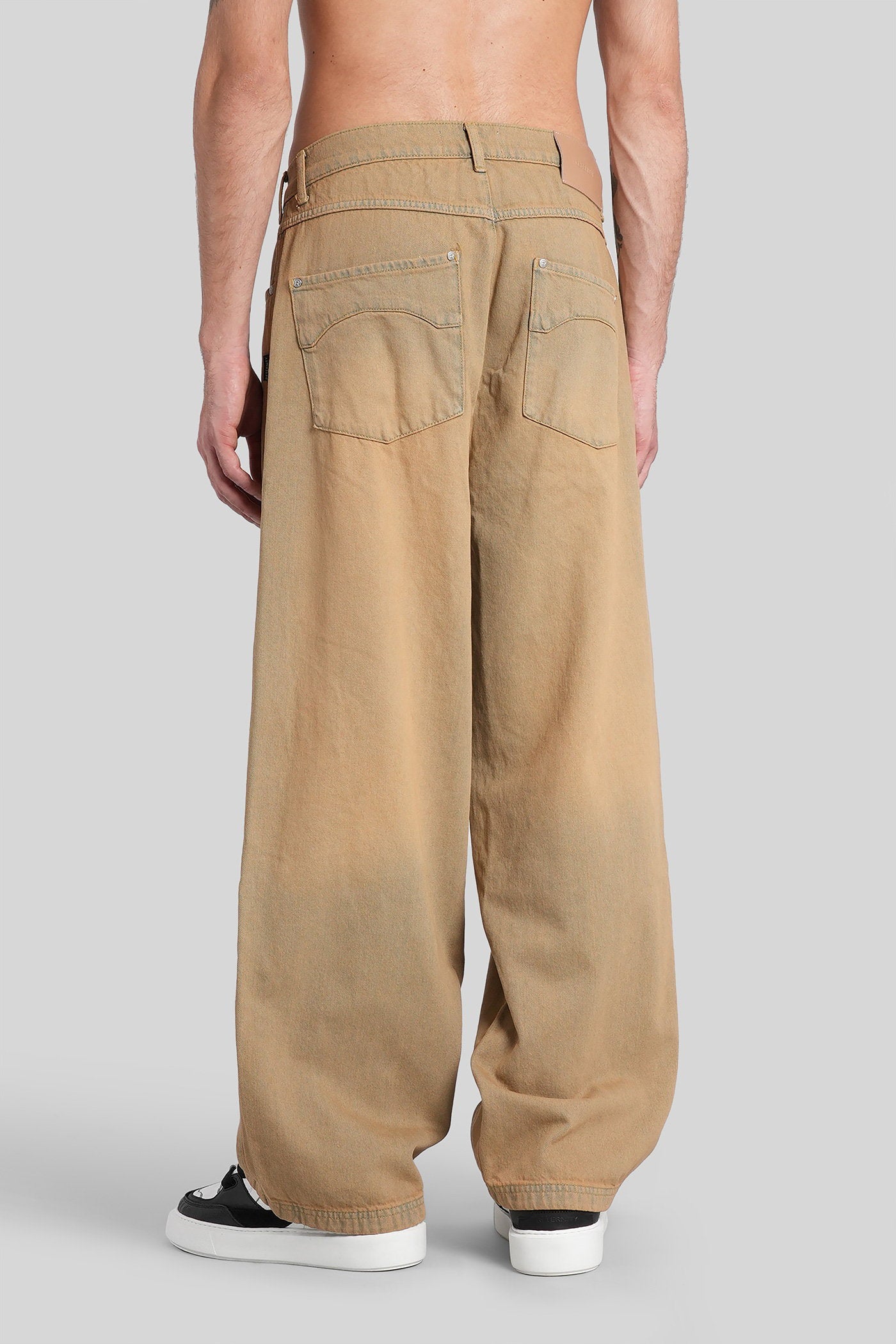 Jeans in beige denim Abbigliamento