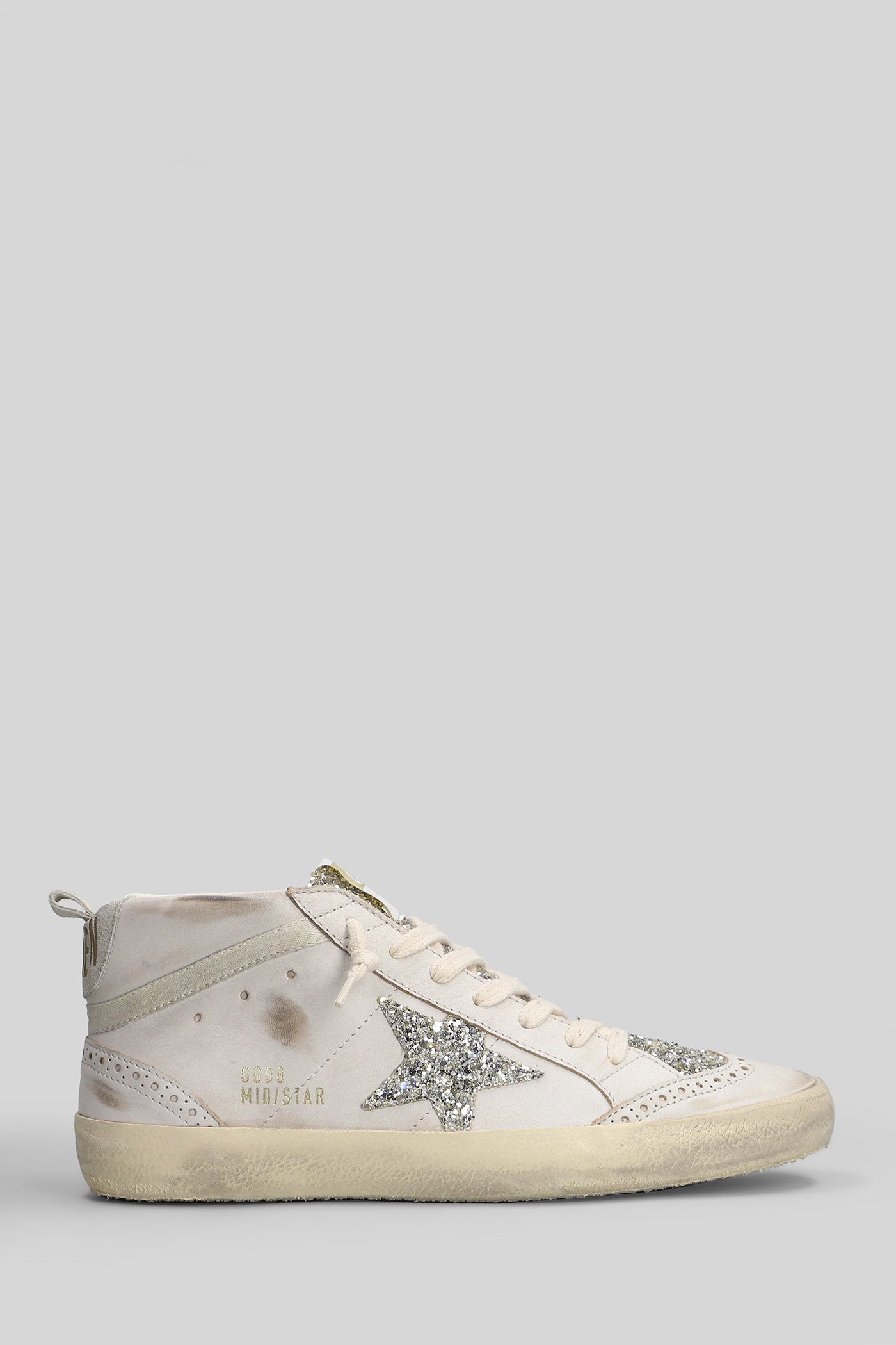 Mid Star Sneakers in beige leather Scarpe