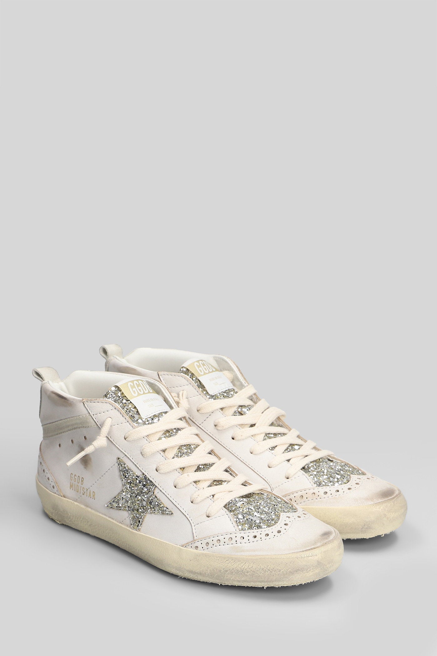 Mid Star Sneakers in beige leather Scarpe
