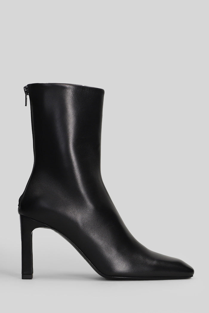 High heels Ankle boots in black leather Scarpe