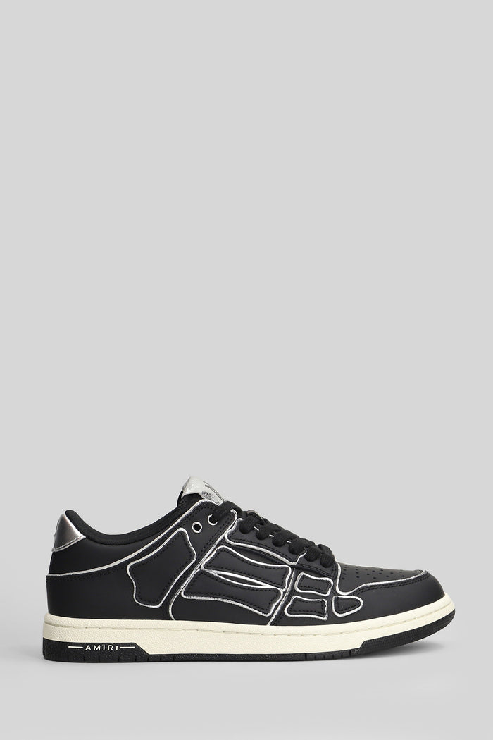 Skel top low Sneakers in black leather Scarpe