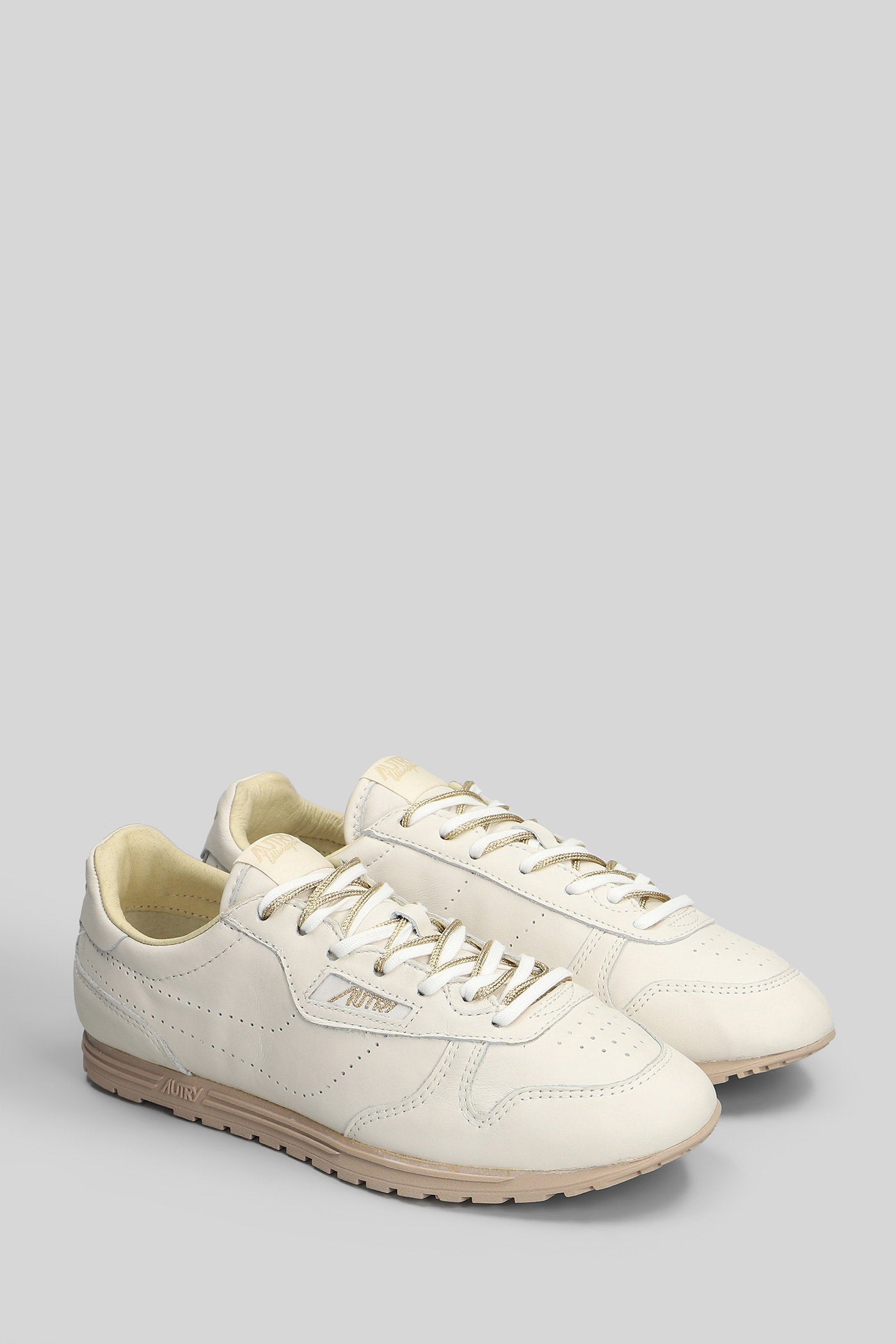 Windspin Low Sneakers in beige leather Scarpe