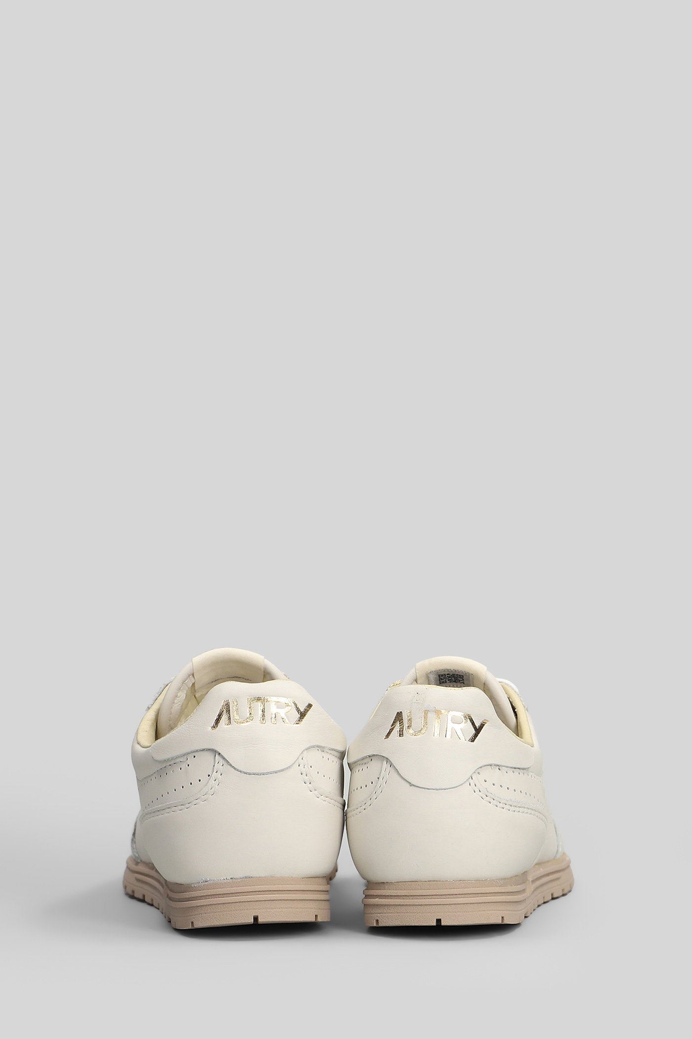 Windspin Low Sneakers in beige leather Scarpe