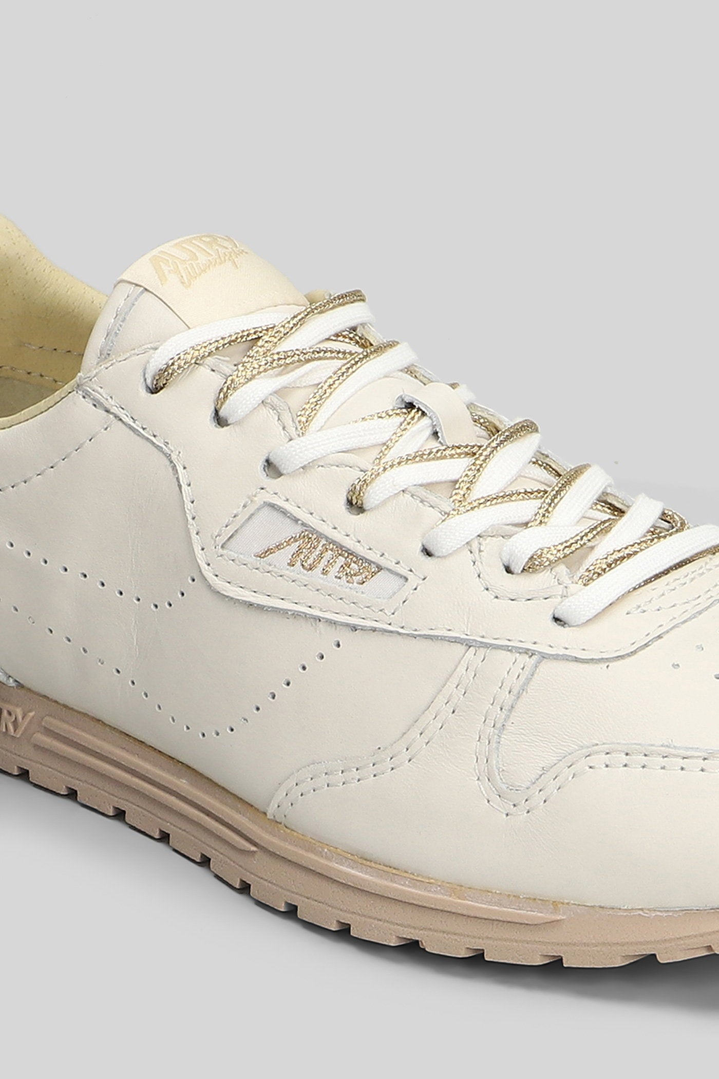 Windspin Low Sneakers in beige leather Scarpe