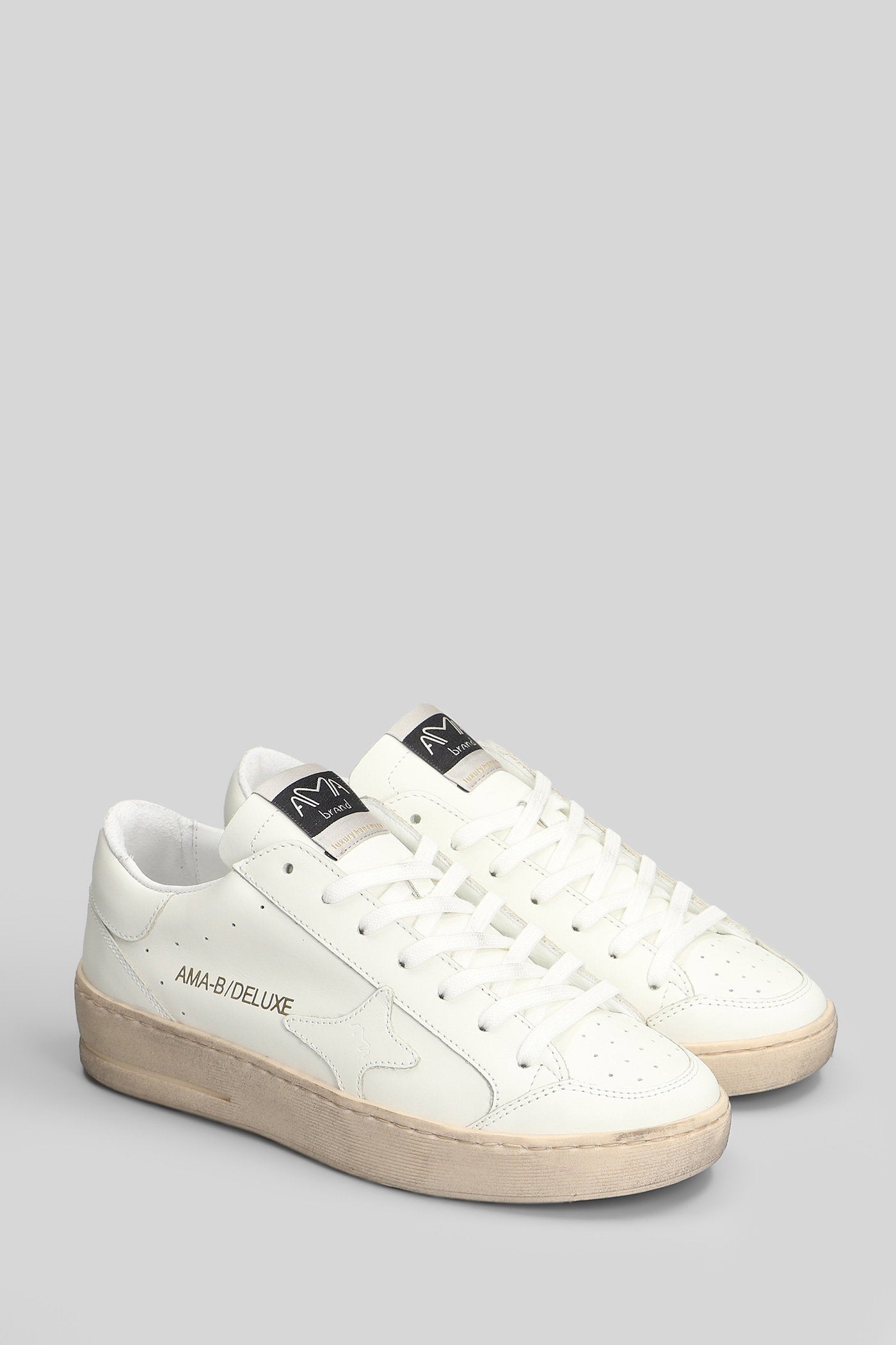 Sneakers in white leather Scarpe