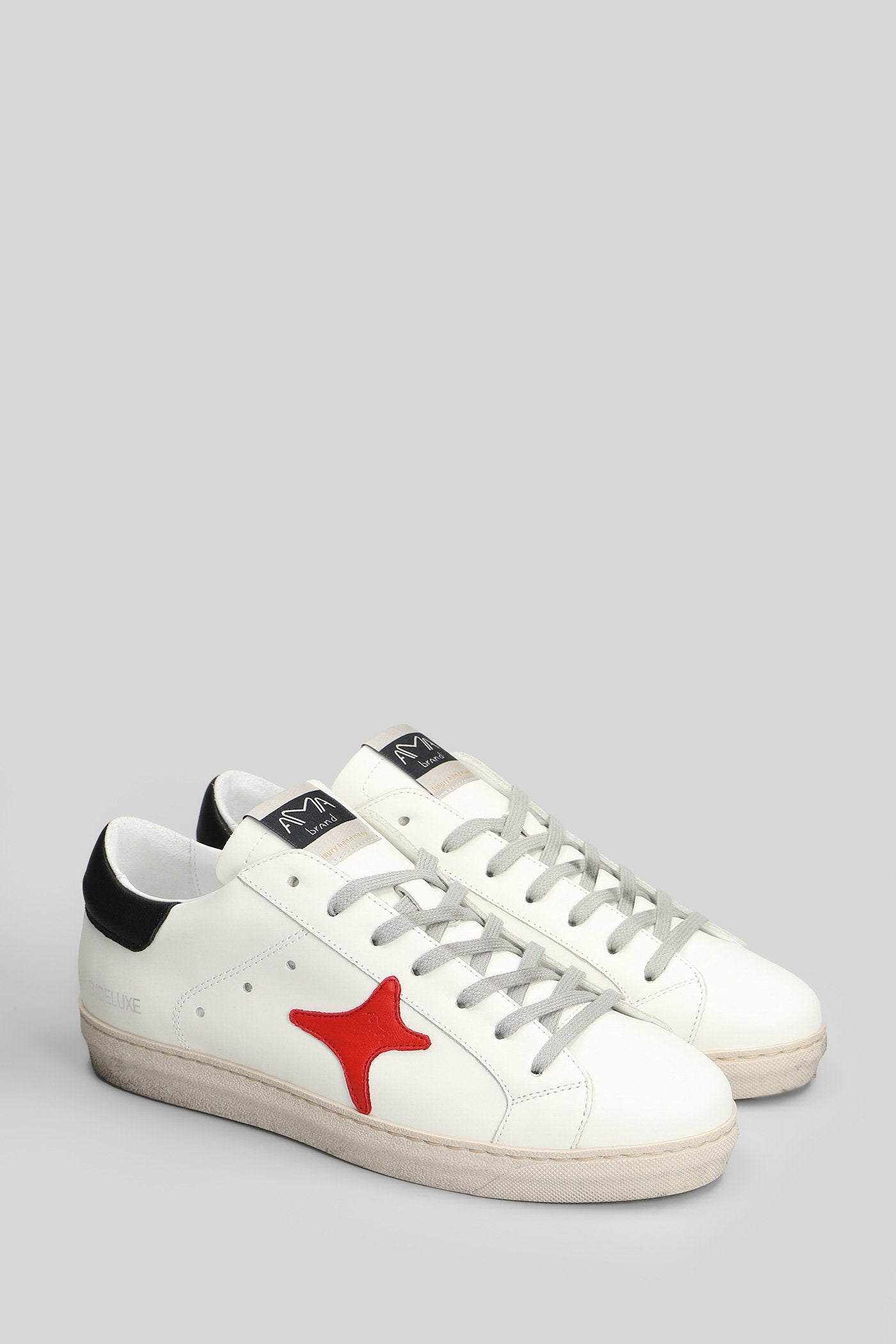 Sneakers in white leather Scarpe