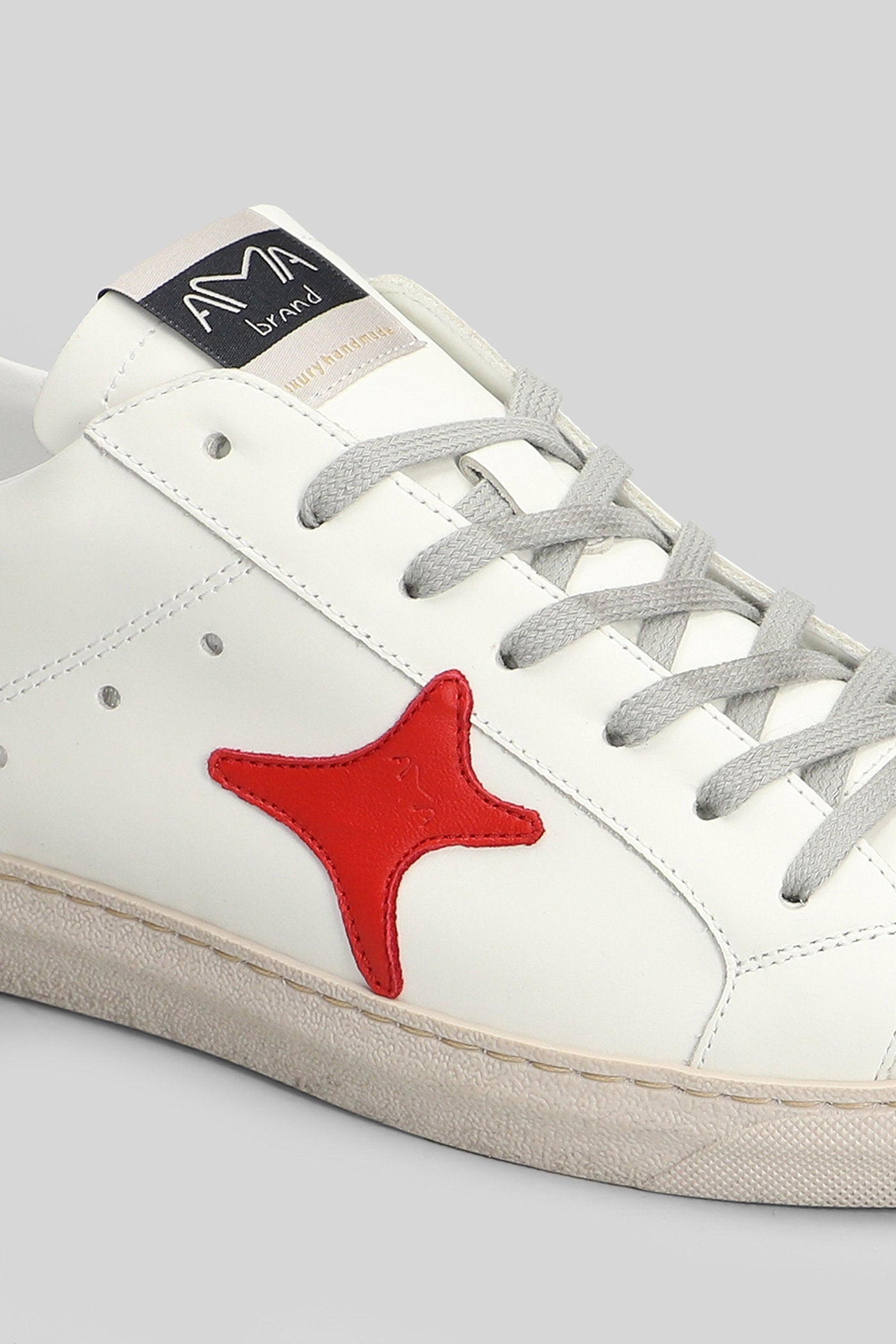 Sneakers in white leather Scarpe