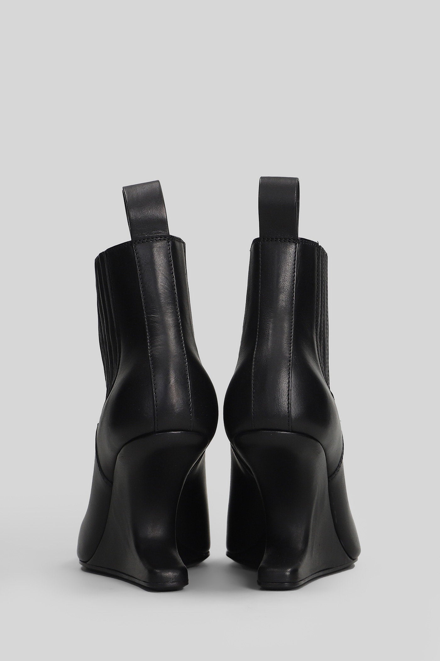Cantilever 8 ankle High heels boots in black leather Scarpe