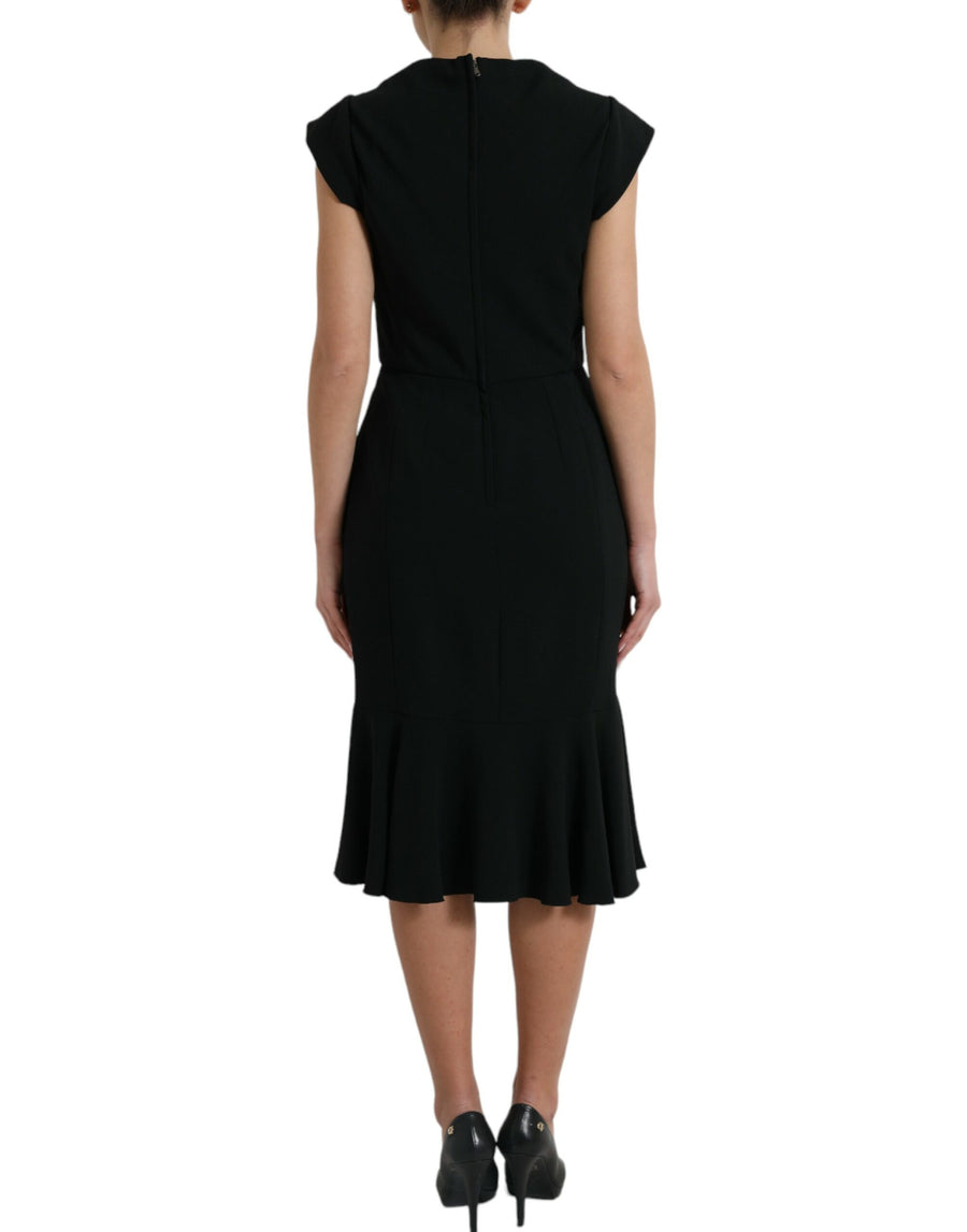 Dolce & Gabbana 51% Viscose 46% Acetate 3% Elastane; Lining: 86% Silk 8% Cotton 4% Elastane 4% Nylon dress in black