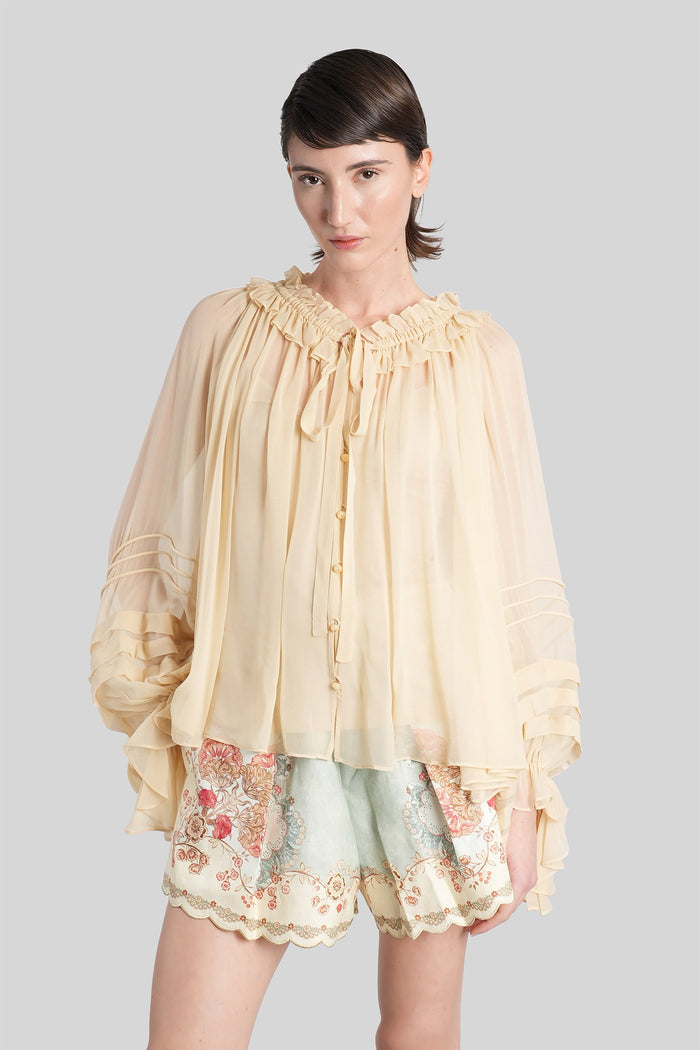 Blouse in beige silk Abbigliamento