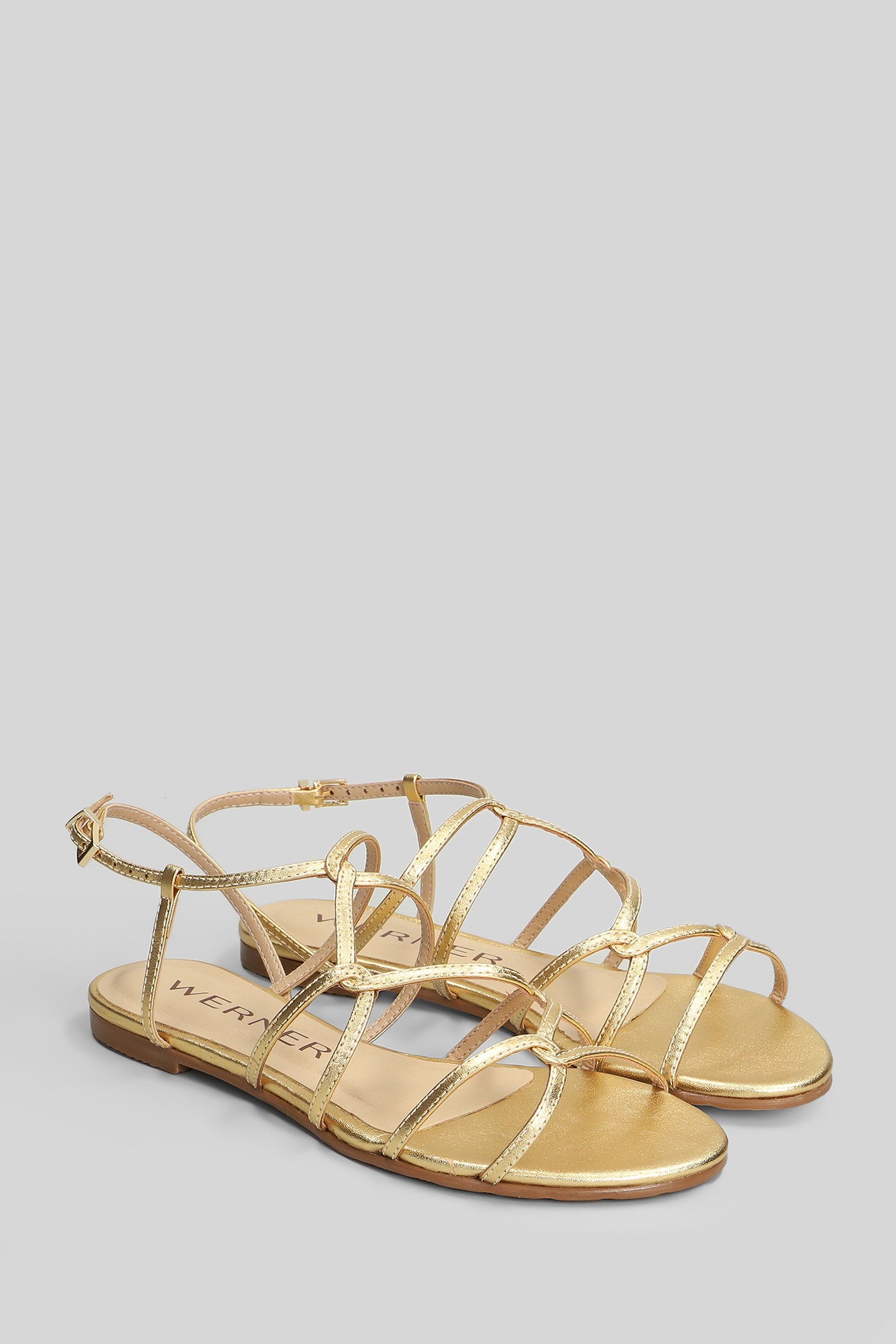 Flats in gold leather Scarpe