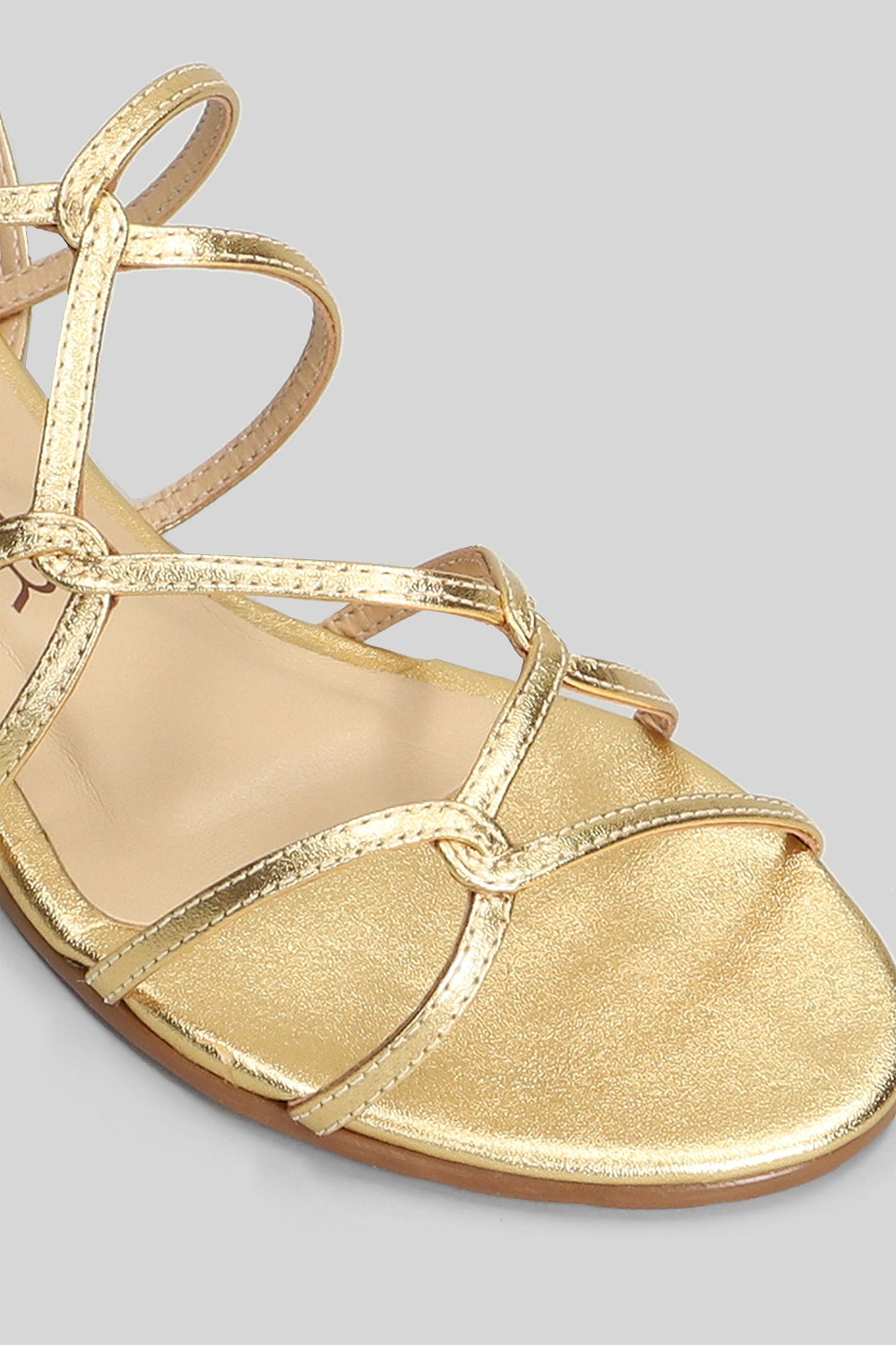Flats in gold leather Scarpe