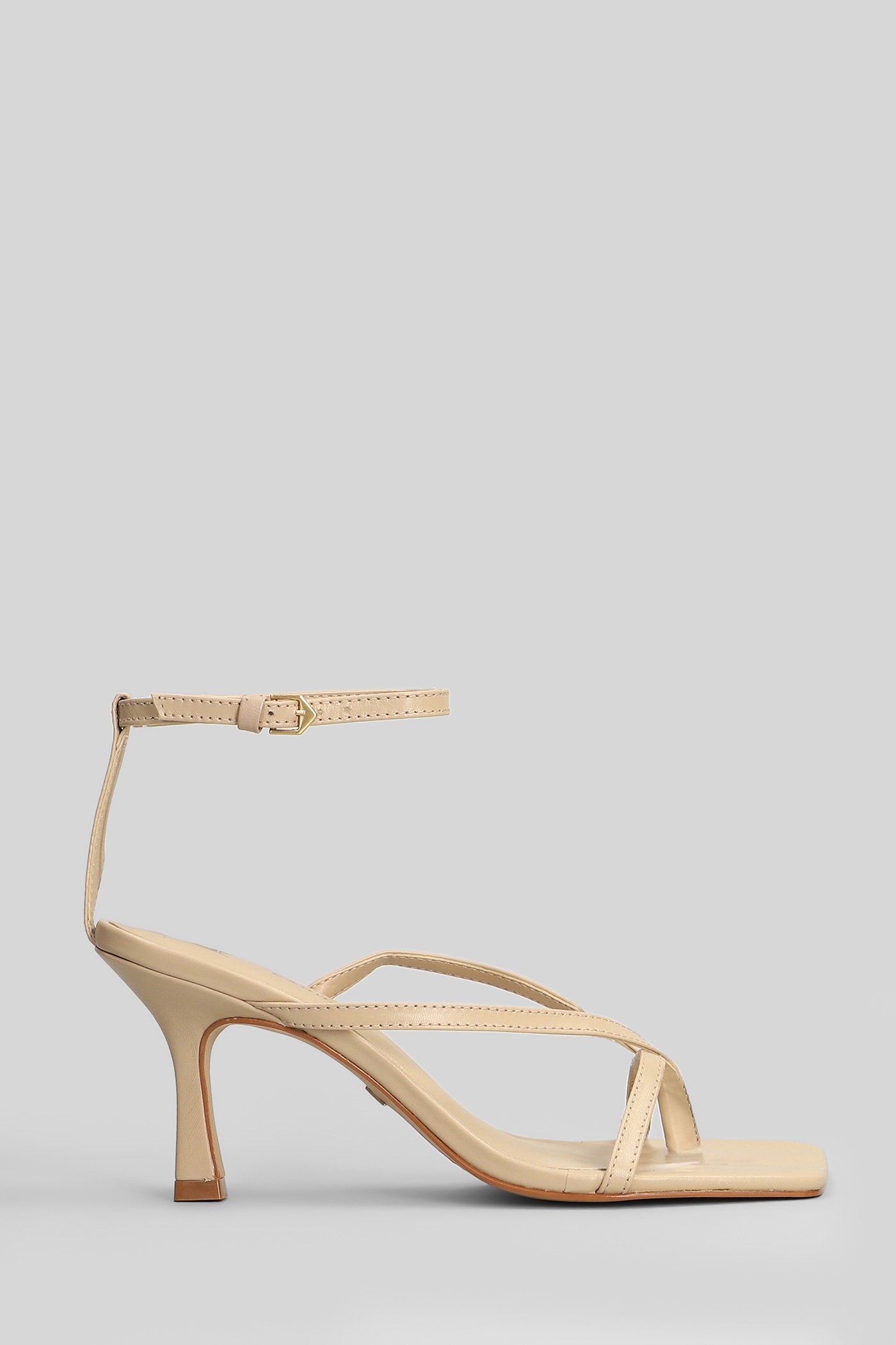 Sandals in beige leather Scarpe