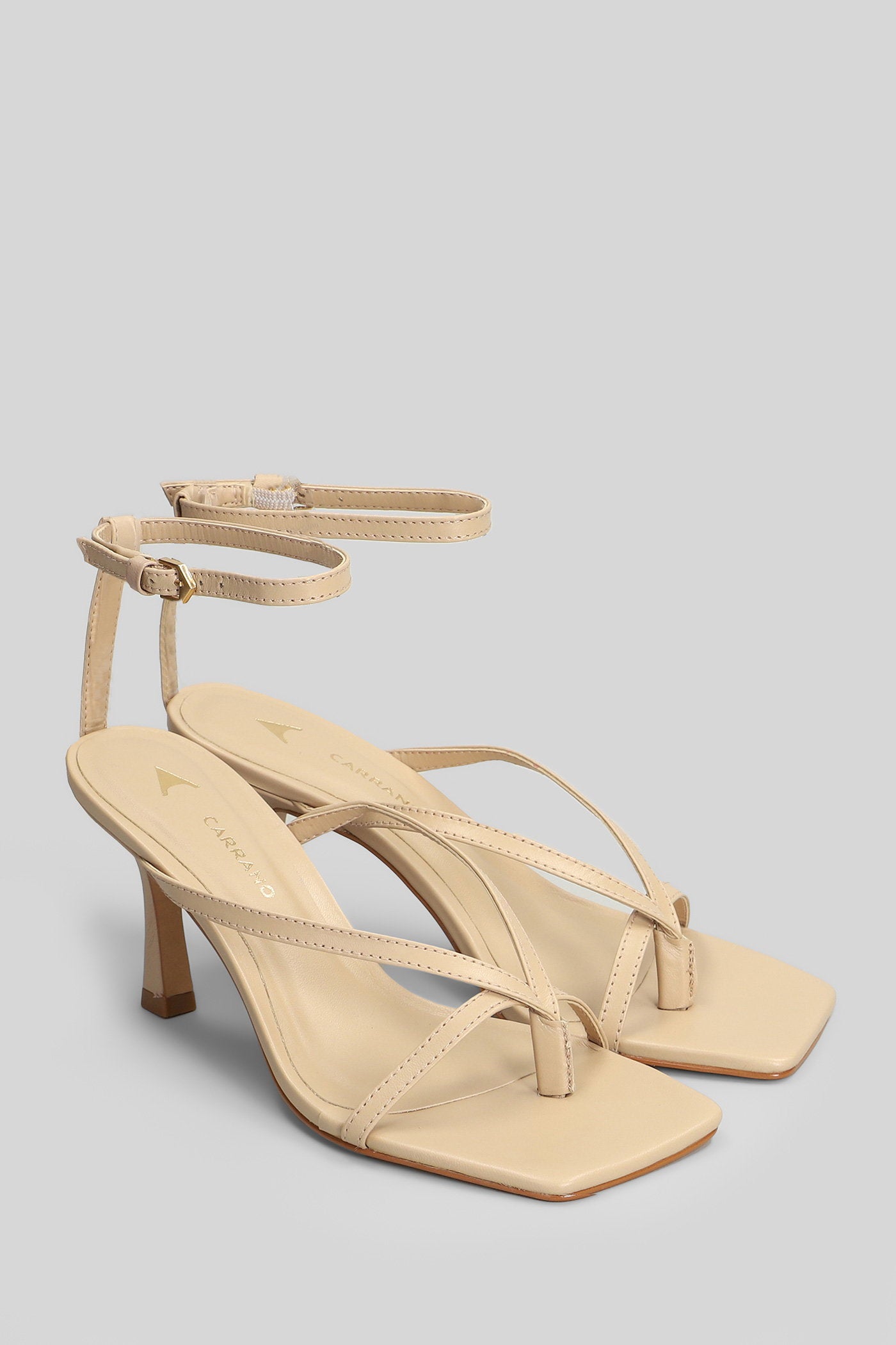 Sandals in beige leather Scarpe