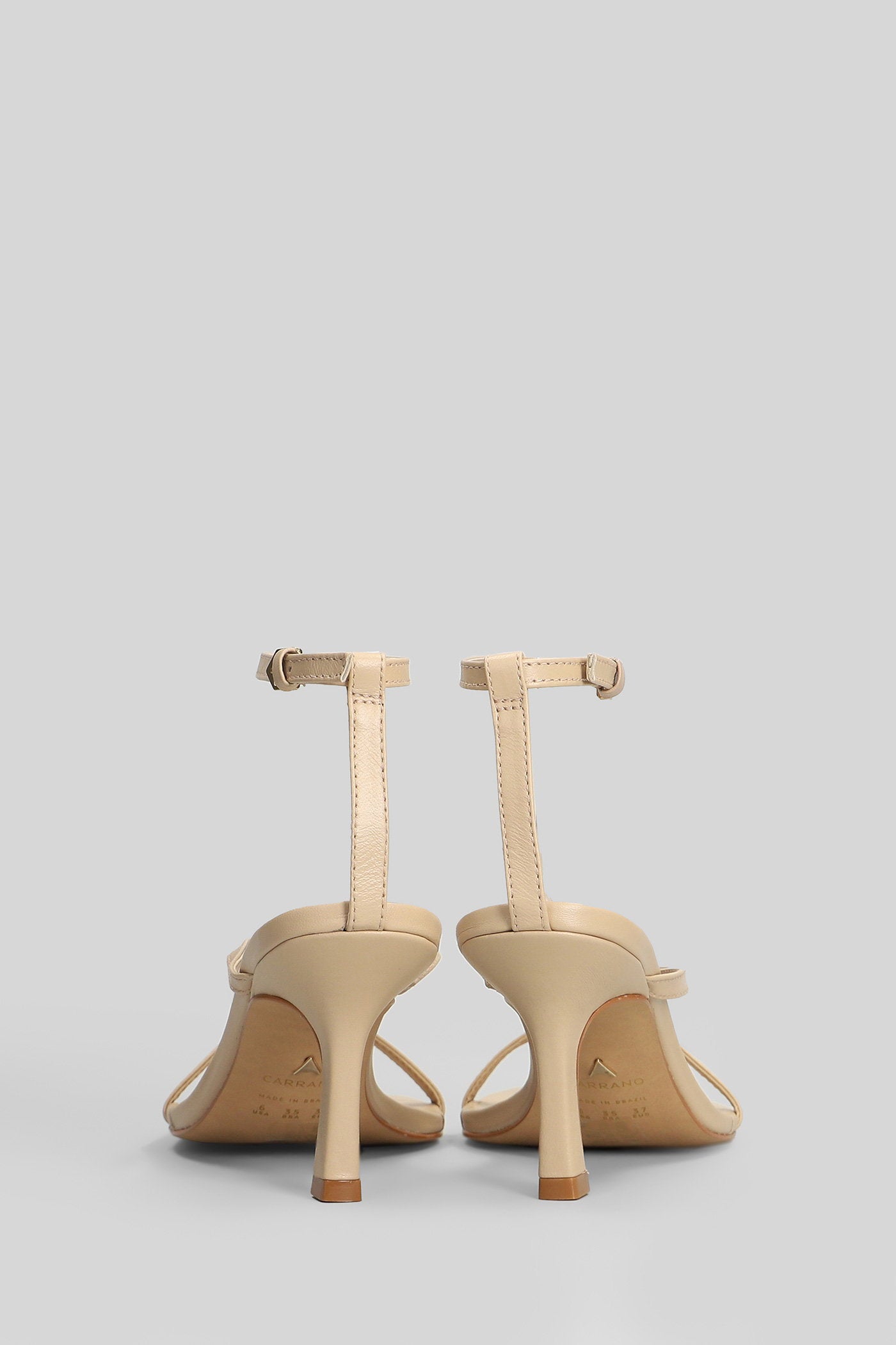 Sandals in beige leather Scarpe