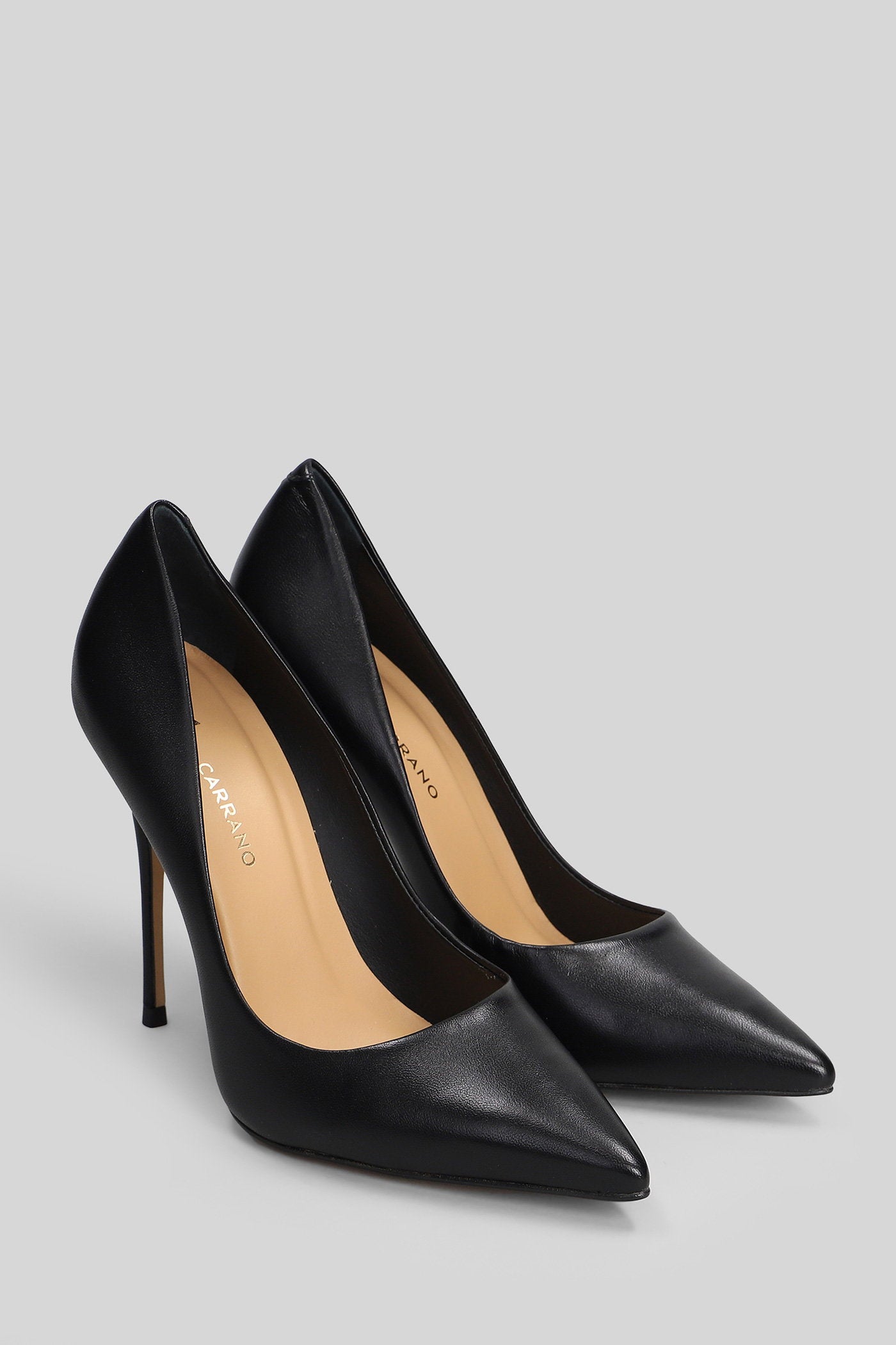 Pumps in black leather Scarpe