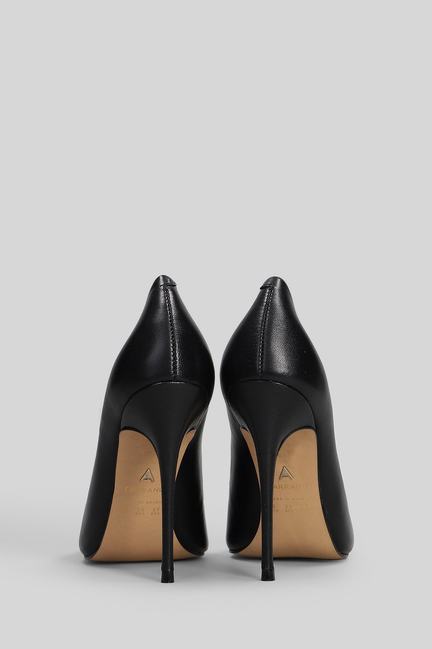 Pumps in black leather Scarpe