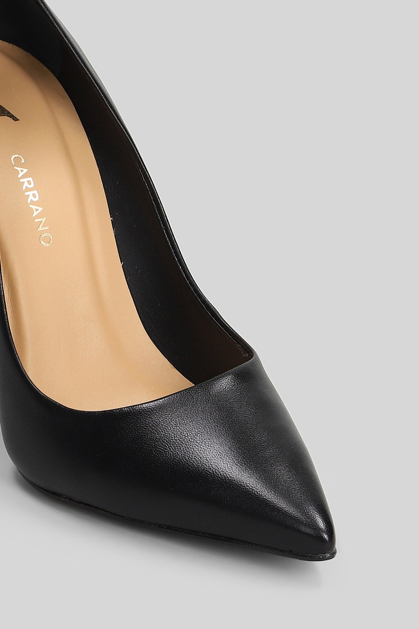 Pumps in black leather Scarpe
