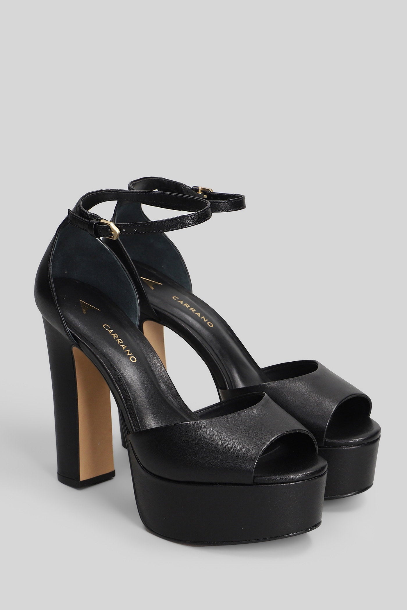 Sandals in black leather Scarpe