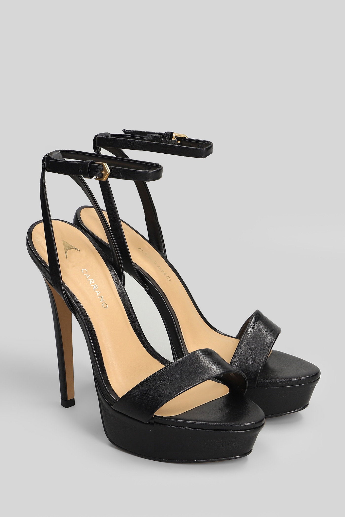Sandals in black leather Scarpe