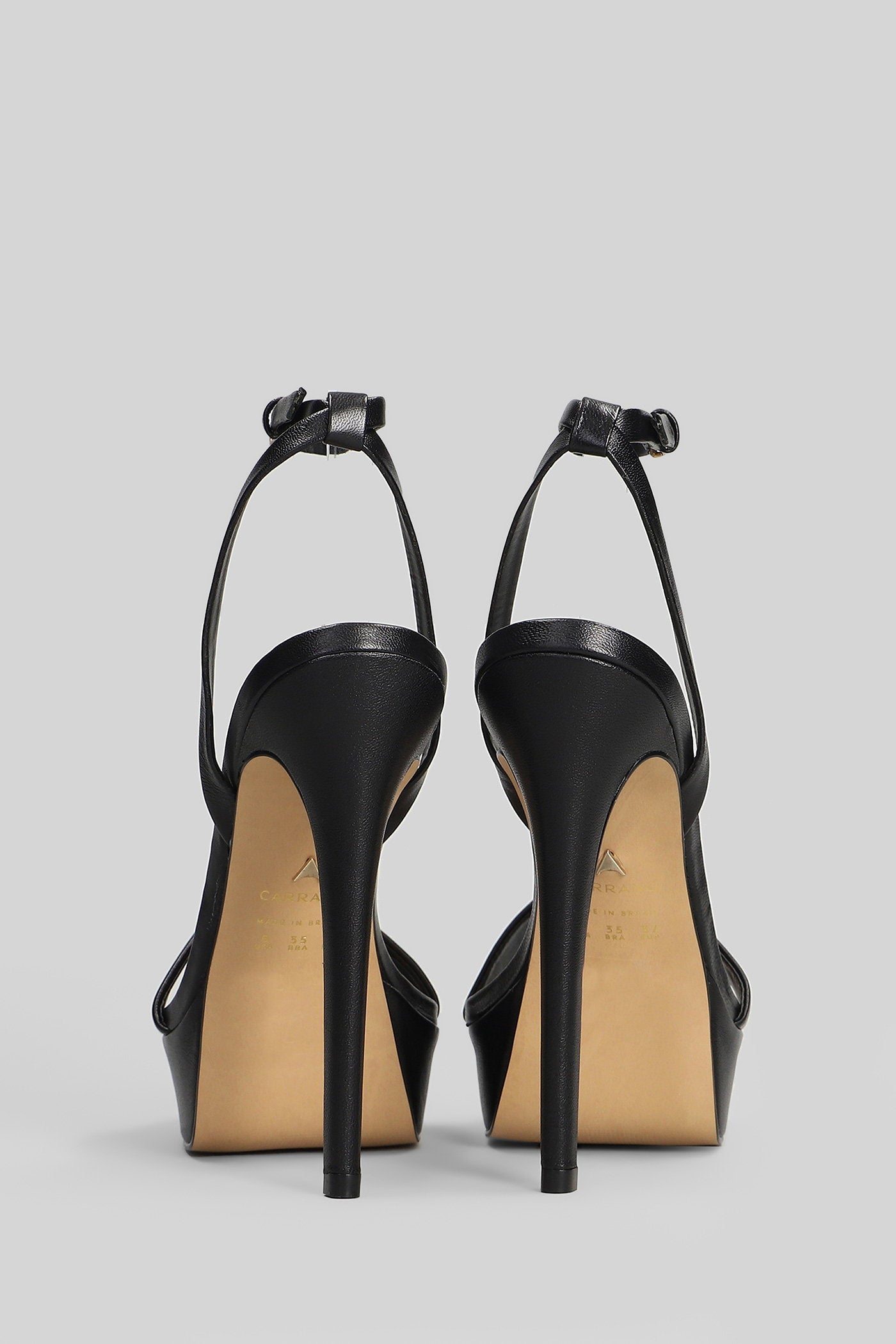 Sandals in black leather Scarpe