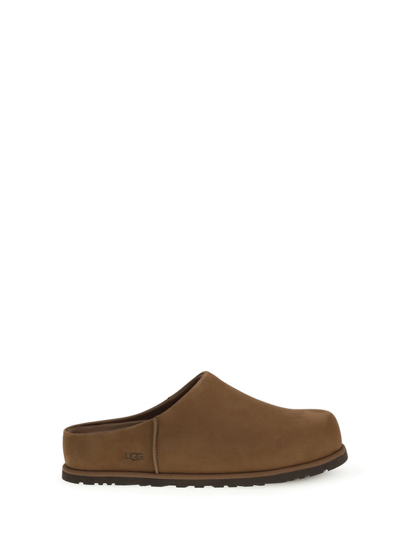 UGG Upper: 100% calf leather; Sole: 100% rubber slipper in brown