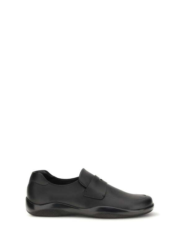 Prada Upper: 100% calf leather; Sole: 100% rubber loafer in black
