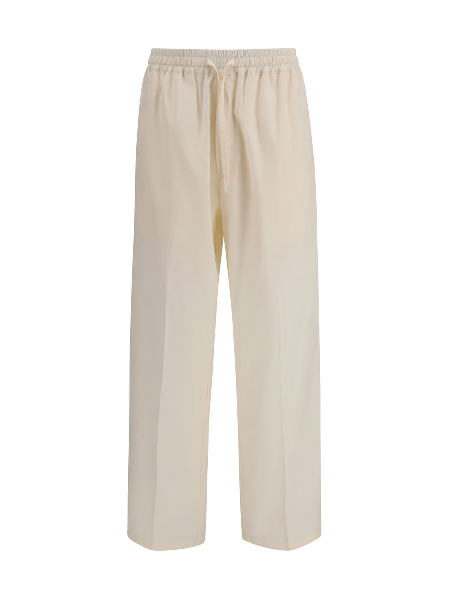 Umit Benan 94% cotton trousers in beige