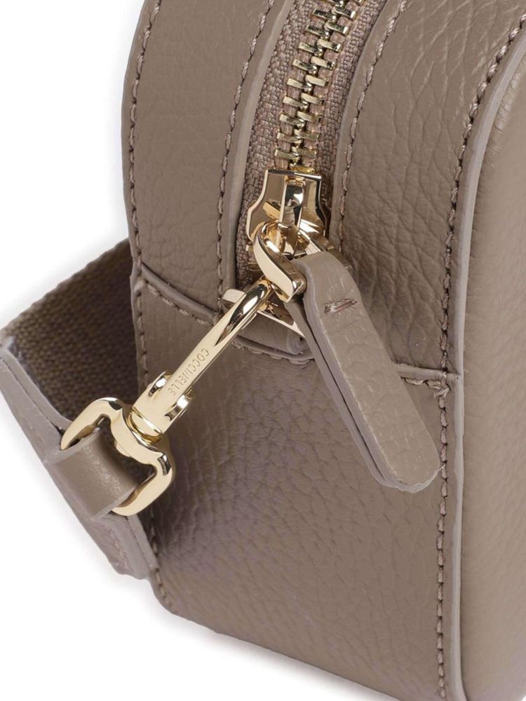 Coccinelle 100% Cowhide | Ribbon: 100% Polyester crossbody bag in taupe