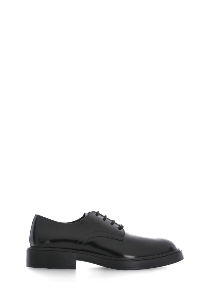 Tods Flat Shoes Black Cow Leather Sole: Rubber