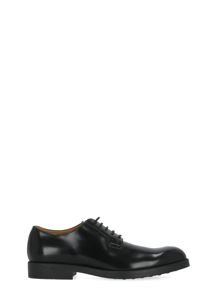 Tods Flat Shoes Black Cowhide Sole: Rubber