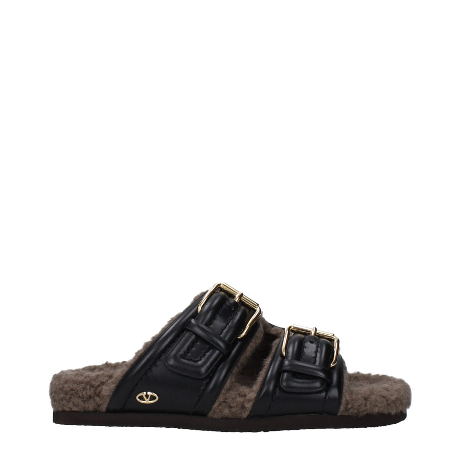 Valentino Garavani Leather with wool-blend fur lining slippers in black