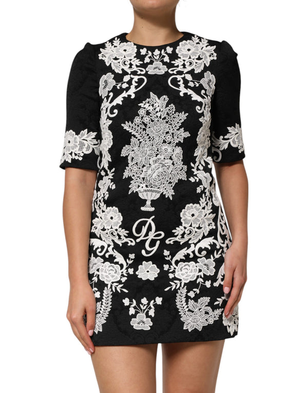 Dolce & Gabbana 57% Polyester 24% Acetate 17% Viscose 2% Elastane; Lining: 94% Silk 6% Elastane dress in black