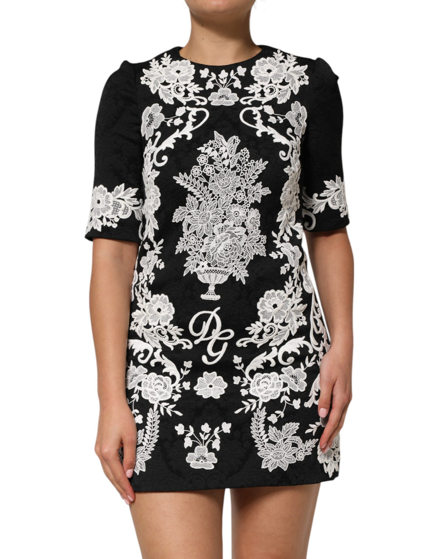 Dolce & Gabbana 57% Polyester 24% Acetate 17% Viscose 2% Elastane; Lining: 94% Silk 6% Elastane dress in black