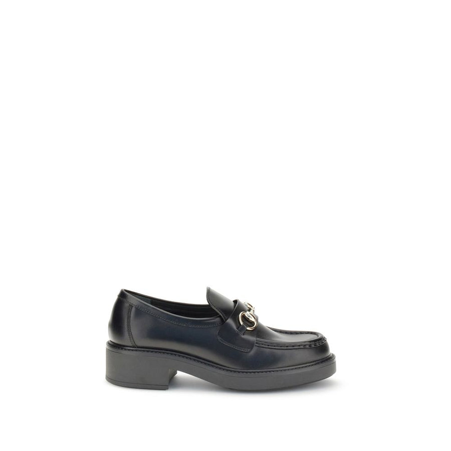 Gucci Upper: 100% Calf Leather Bos Taurus; Sole: 100% Rubber loafer in black