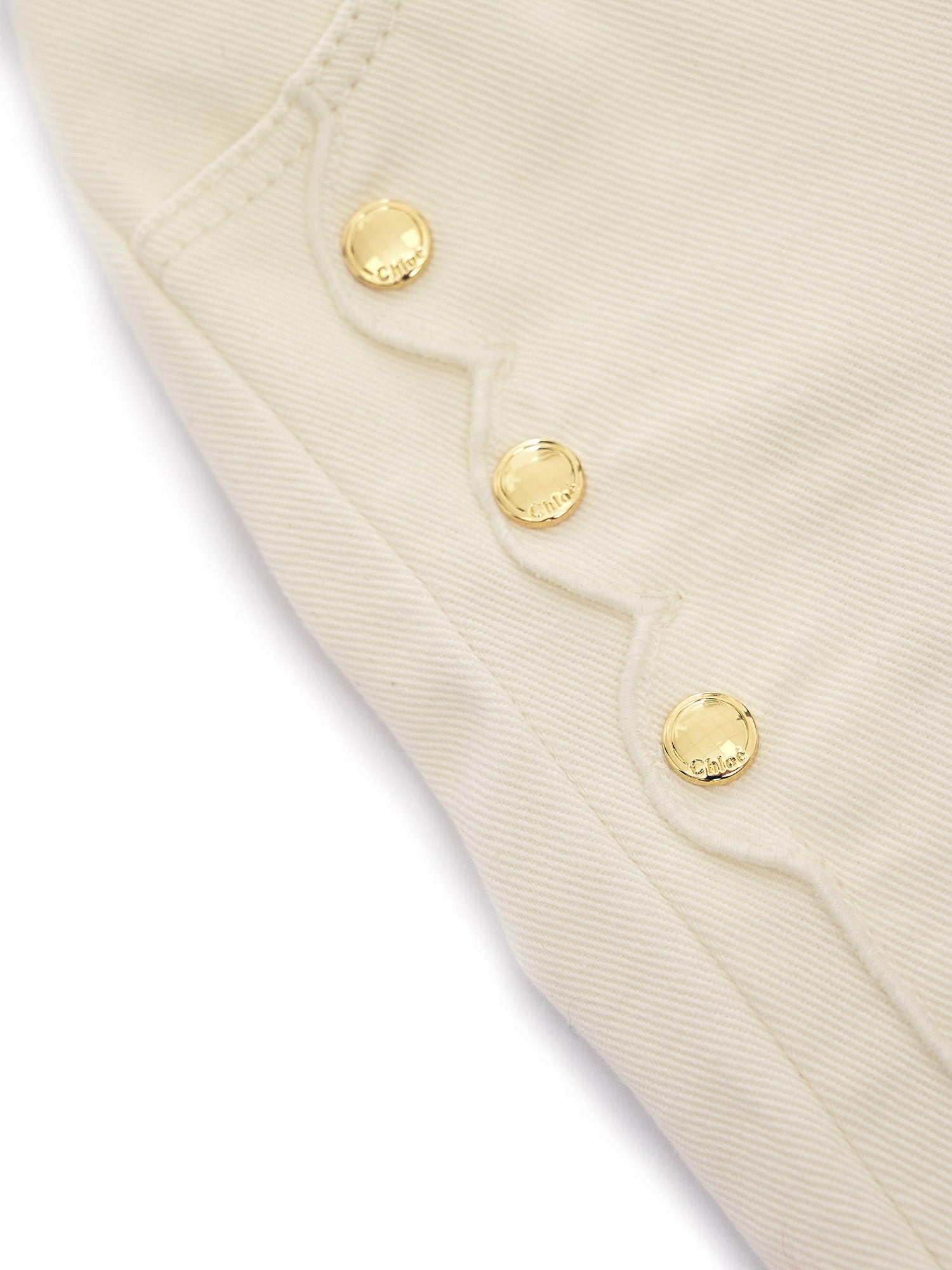 Five-pocket organic drill pants with scallops on front. Waist and zipper fly closure, Chlo� branded button. Paris cow leather label at back (leather source : Italy). Model inspired by the adult collections. White Cotton Lining Jean