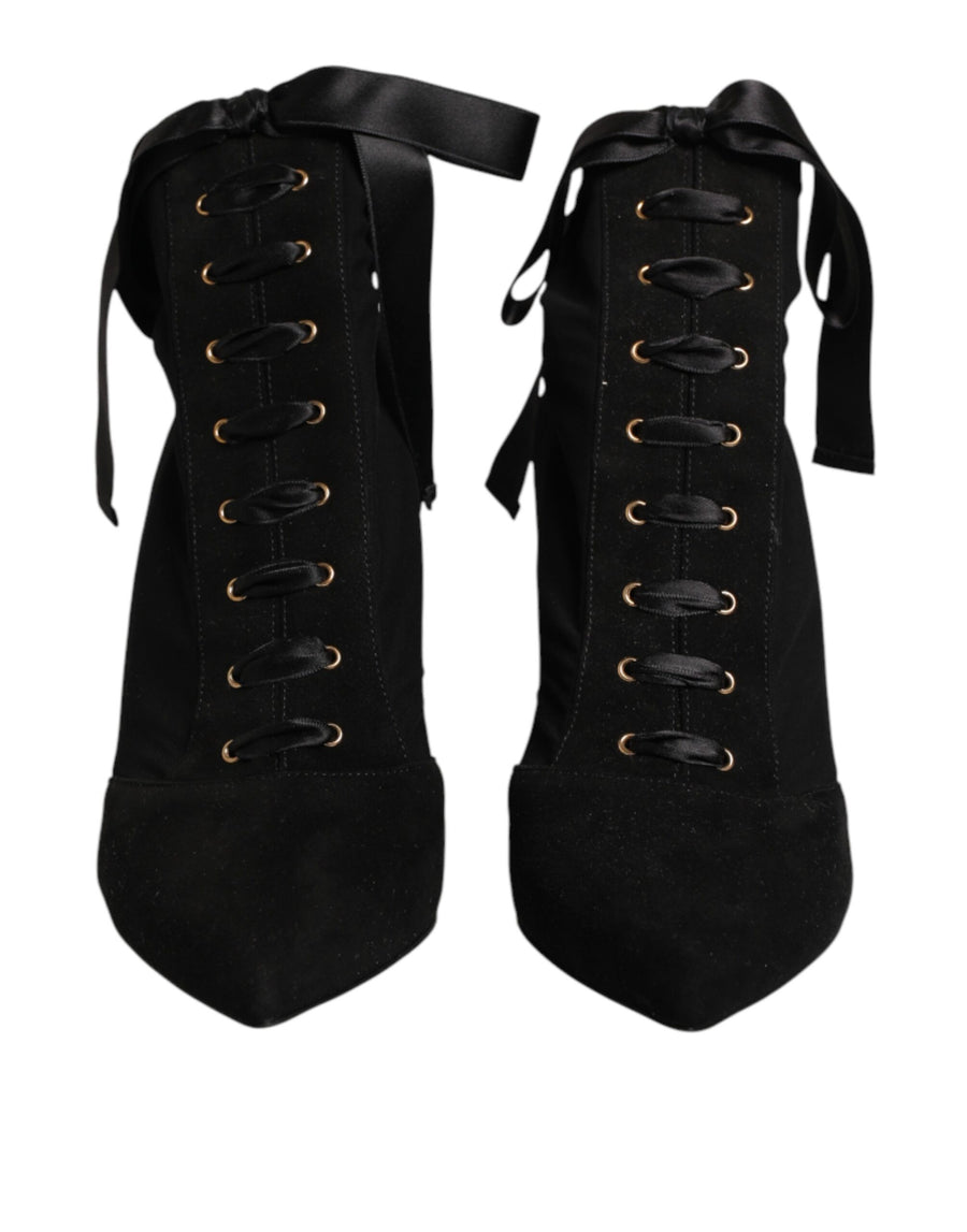 Dolce & Gabbana 02% + 51% Viscose + 47% Goat leather; Interior: 100% Goat; Sole: Leather heel boot in black