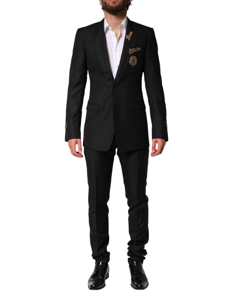Dolce & Gabbana 100% Virgin Wool (jacket and trousers); Lining: 34% Acrylic suit in black
