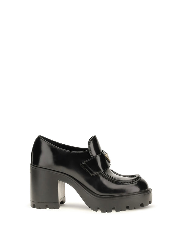 Prada Upper: 100% calf leather; Sole: 100% rubber loafer in black