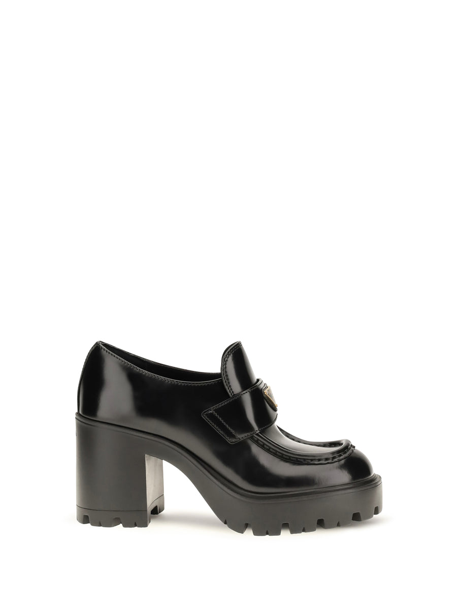 Prada Upper: 100% calf leather; Sole: 100% rubber loafer in black