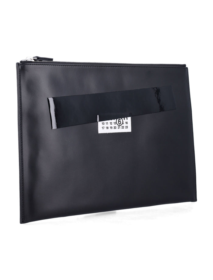 MM6 Maison Margiela black leather pouch with logo and tape detail Bovine