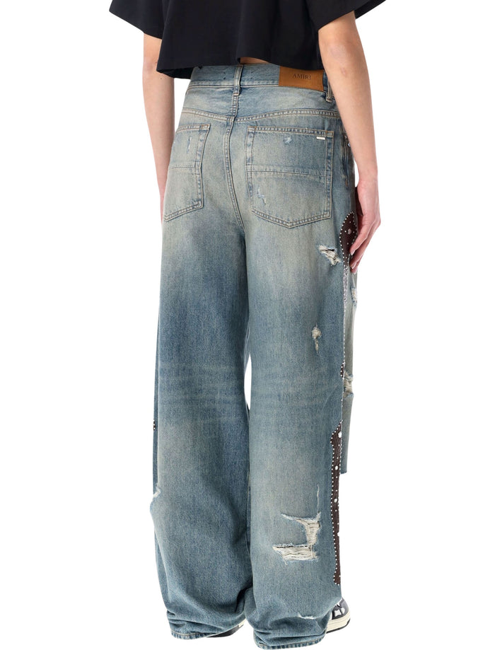 Amiri Bones wide-leg studded jeans Driftwood Blue Cotton
