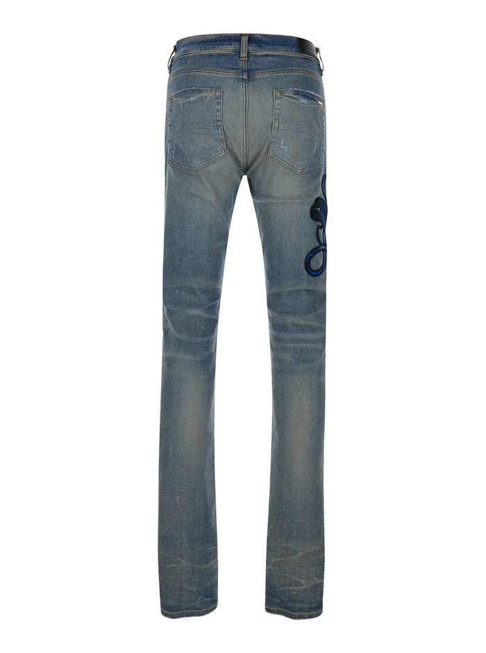 Light Blue Skinny Jeans With Rips And Snake Patch Stretch Denim Man