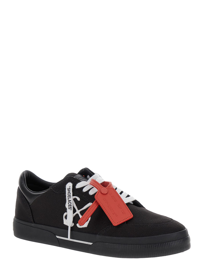 Black Low Top Sneakers With Arrow And Tag Detail Canvas Man