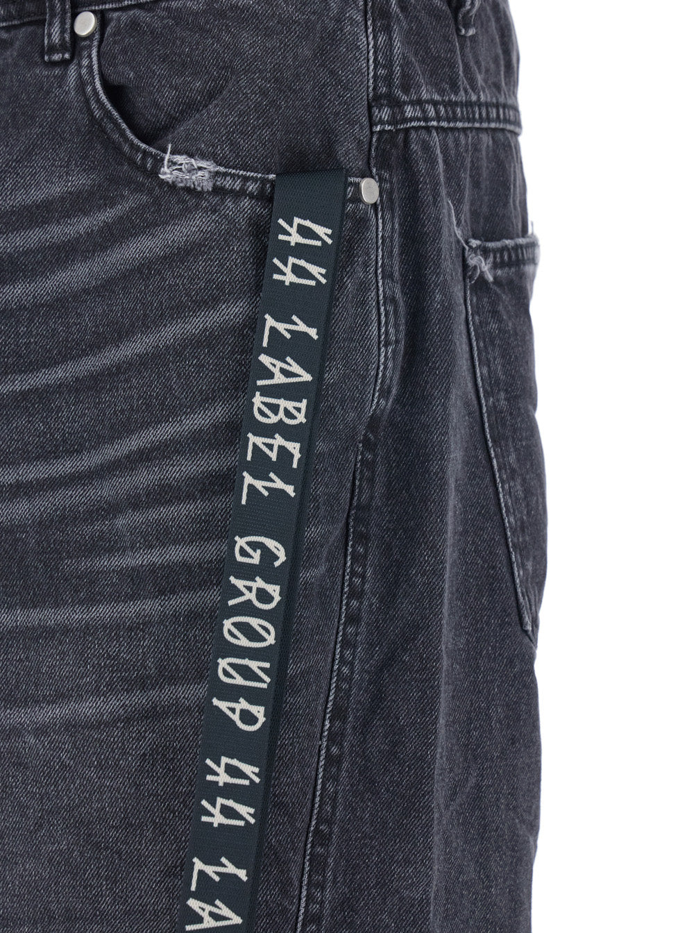 Black Jeans with Logo Patch on the Rear and Side Strap in Denim Man