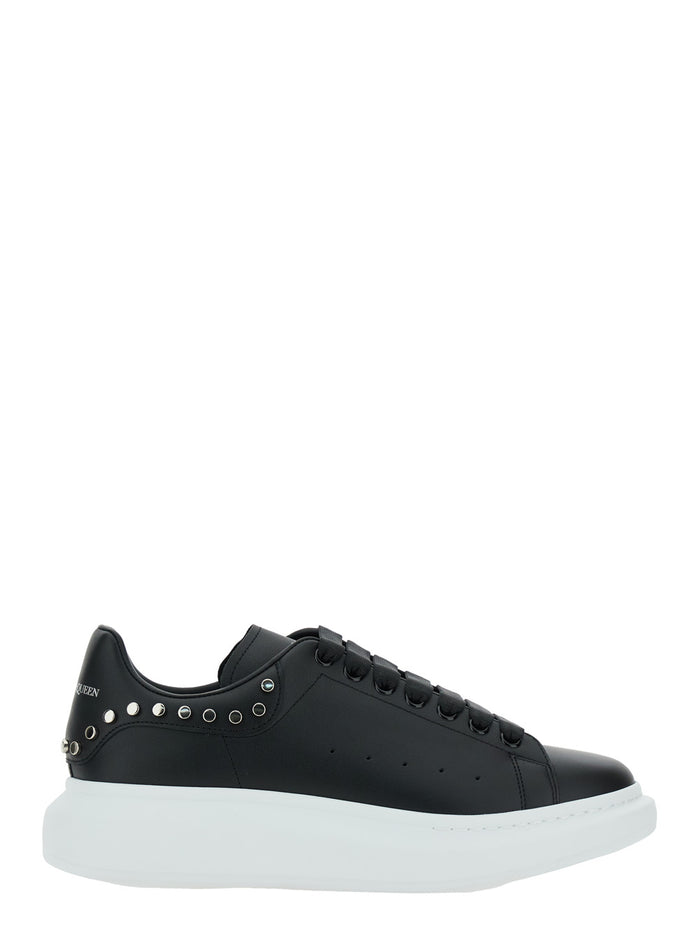 Black Low Top Sneakers with Stud Embellishments in Leather Man Calf
