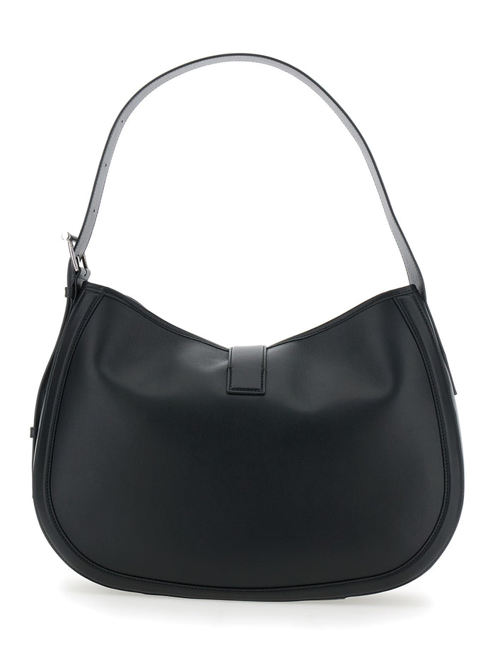 Black Shoulder Bag with Adjustable Strap and T Buckle Closure on the Front in Leather Woman Calf