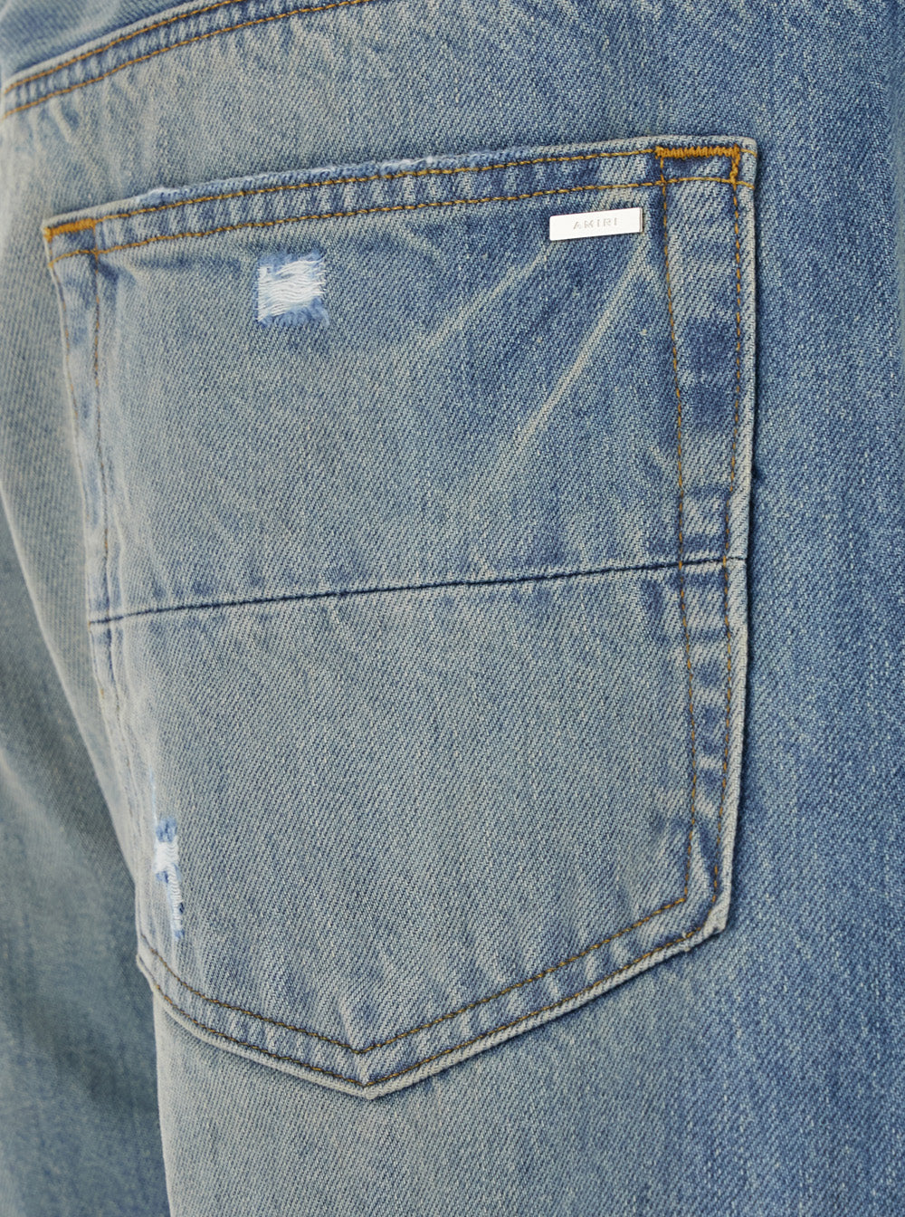 Blue Jeans with Ripped Details on the Front and Logo Patch Rear in Denim Man Blu Cotton