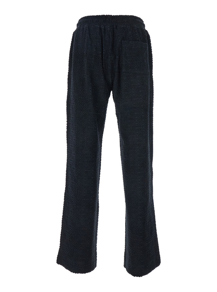 Black Pants With All-Over Embossed Monogram And Drawstring Waist Cotton Man Polyamide Elastane Trousers