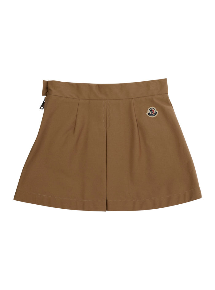 Beige Pleated Skirt with Logo Patch on Back in Cotton Girl Elastane